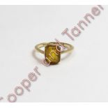 A 9 carat gold single stone citrine dress ring, finger size K, 1.3 g gross, cased