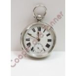 A large Edwardian solid silver pocket watch dated 1902 retailed by H Stowe, Leeds