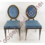 A pair of blue upholstered brush steel frame chairs