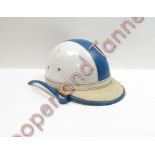 A vintage motor cycle helmet, white with a blue stripe, with original fitted interior and white