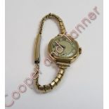 Anonymous, a 9 carat gold lady's mechanical wrist watch, on a plated bracelet
