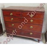 A 19th Century mahogany chest of two short and three graduated long drawers on turned supports