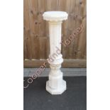 An alabaster pedestal stand, 63cm high