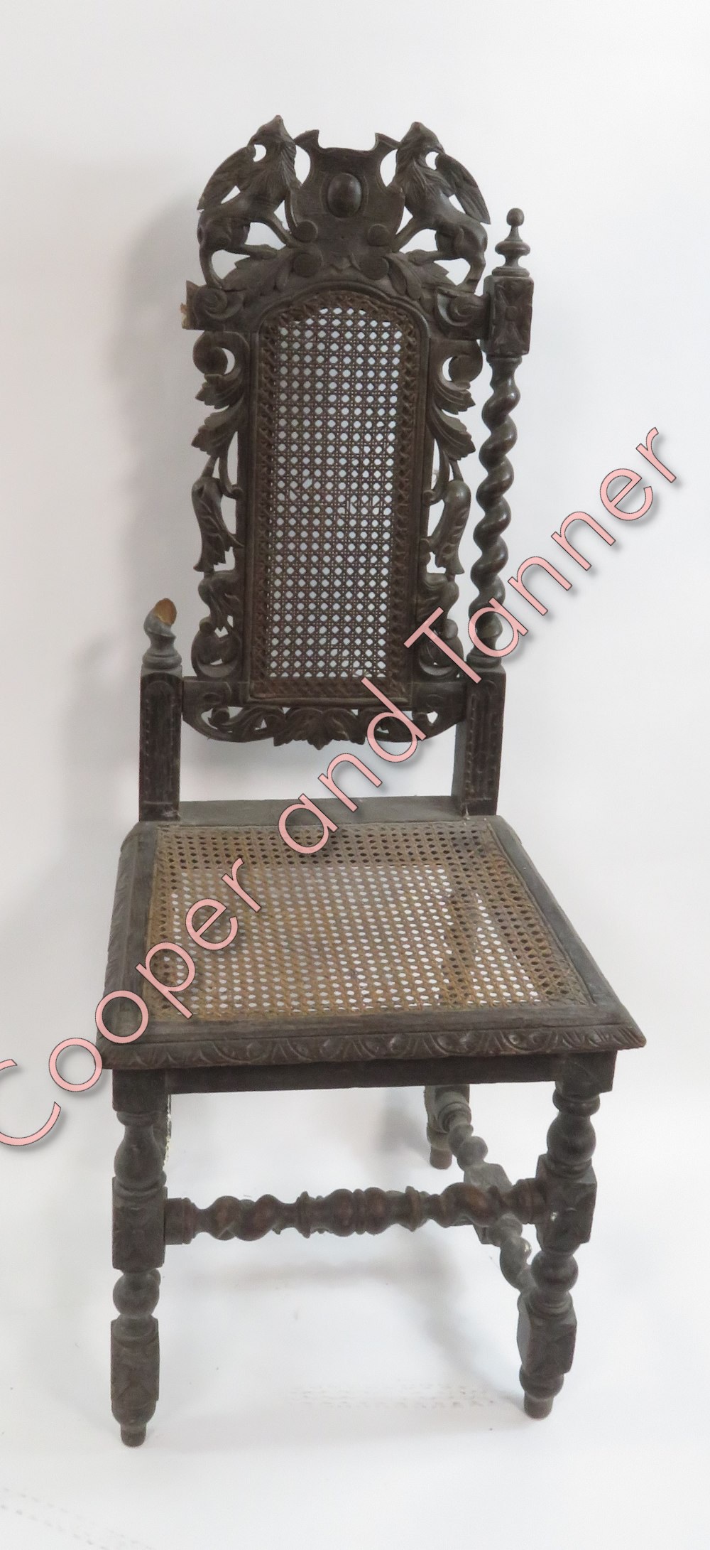 A set of four carved oak dining chairs in the Jacobean style with cane backs and seats - Image 2 of 2