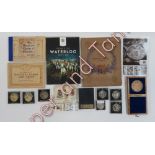 A collection of coins including commemorative crowns, a part set of Waterloo coins, along with