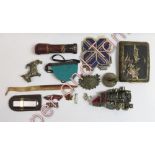 A collection of miscellaneous items including a Japanese cigarette case and other collectables
