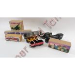 Three tin train carriages, along with track and four reproduction tin plate toys