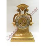 A large open face late 19th century brass case 8 day French mantel clock. Silvered chapter ring with