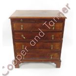 A Georgian style walnut veneered Batchelors chest of four graduated long drawers with brushing