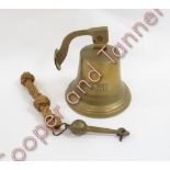 A brass bell cast with “1841” to one side, with brass wall mounting and striker on spliced rope,