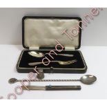 A cased silver spoon and fork christening set, Birmingham 1930; with a silver retractable small