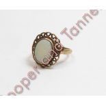 A 9 carat gold single stone opal dress ring, finger size K1/2, 3.4 g gross