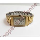 H&R Marsh, Bath, a gentleman's 9 carat gold wrist watch, the rectangular signed dial with black