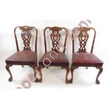 A set of eight (6 standard 2 carver) mahogany 19th Century style dining chairs with foliate