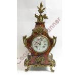 A French boulle style 8 day mantel clock striking on gong, the case with tortoiseshell style