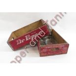 Dr Pepper Bottling Company - two wooden crates with white lettering on red ground, metal bracing