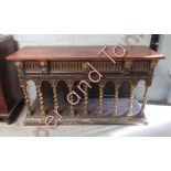 A late 19th Century Continental sideboard with carved and gilded decoration, lion mask mouldings