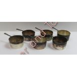 A set of six silver plated small pans