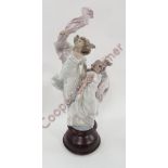 A large Lladro figure “Allegory of Liberty” in box with socle stand