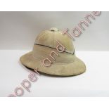 A pith helmet by Gieves Ltd with original inner label, fittings and adjustable chin strap, size 71/