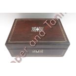 A Victorian rosewood jewellery box with mother of pearl inlay and inner lift-out drawer