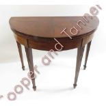 A 19th century mahogany inlaid D-End table, 72cm high,91cm diameter