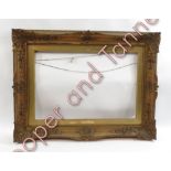 A late 19th Century gilt gesso picture frame, aperture 50cms x 75cms