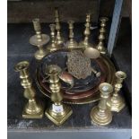 COLLECTION OF BRASS CANDLESTICKS, PLATES ETC