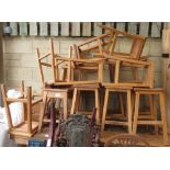 17 WOODEN SCHOOL STOOLS SOME MATCHING