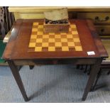 GAMES TABLE WITH A BOX OF CHESS PIECES
