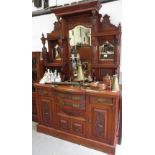 HEAVILY CARVED MIRRORED BACK MAHOGANY SIDEBOARD