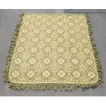 WOOL THROW WITH TASSELLED EDGING
