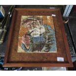 A CERAMIC TILE PORTRAIT OF A FISHERMAN