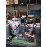 BRONZED HORSE ON BASE, A FLORAL DECORATED CERAMIC LAMP & A HORSE AND CART MODEL ## pat tested ##