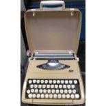 SUPERB EMPIRE CORONADE LUXE PORTABLE TYPEWRITER