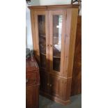 PINE CORNER UNIT WITH GLAZED DOORS TO TOP