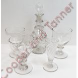 An early 19th Century glass decanter engraved with initials and with blown stopper; 25cms high