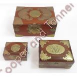 A brass bound hardwood Chinese box the hinged cover with bat motifs and with brass lock, side