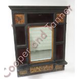 A late 19th Century Aesthetic movement style wall mirror the painted wood frame with gilt panels