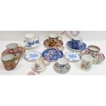 Five decorative cabinet cups and saucers including Crown Derby; miniature cups and saucers and