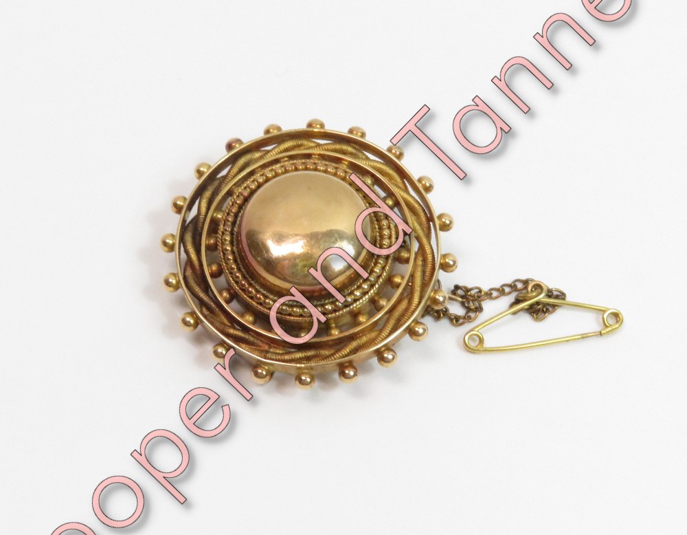 A Victorian unmarked gold brooch, of circular outline, 3.3 cm diameter, 11 g gross