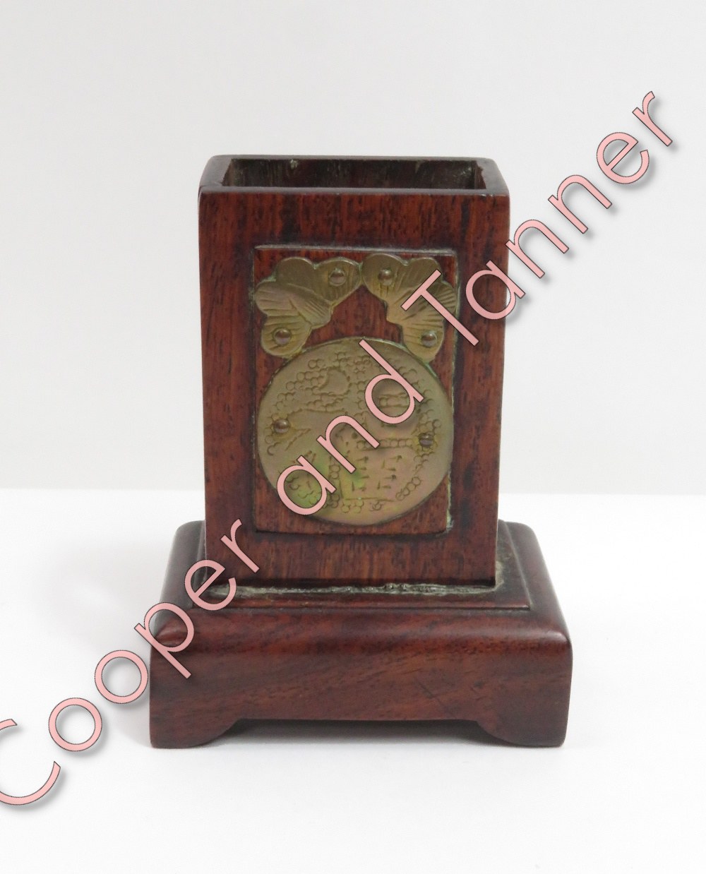 A Chinese brass mounted hardwood matchbox stand 9cms high