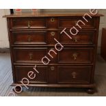 An early 18th Century oak chest of drawers later converted to having a coffer top above two long