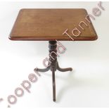 A Georgian mahogany tilt top pedestal wine table on splayed tripod support, 73cms high