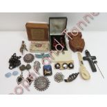 A collection of assorted jewellery items, including; a reverse painted butterfly wing pendant; a