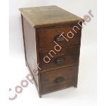 A circa 1930' s three drawer filing cabinet, each drawer with original metal cup handle 58cms high