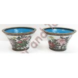 A pair of Japanese cloisonné bowls of flared form decorated with peonies and butterflies within