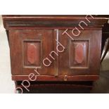 A 19th Century swedish painted pitch pine wall cabinet with moulded pediment, pair of panelled doors