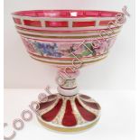 A 19th Century pink and overlaid white glass pedestal bowl with hand painted band of mixed flowers