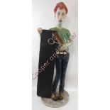 A circa 1980's/90's hairdressers shop display model, painted composition, the figure supporting a
